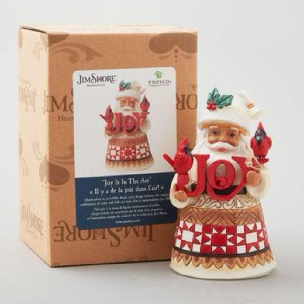 Jim Shore Festive Red and Cream Santa Figurine